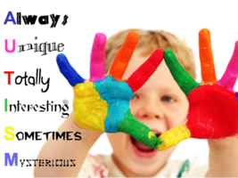 A child with colored hands and an inscription about autism