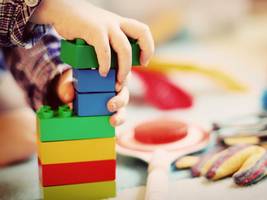 A child playing with cubes