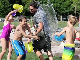 Children play with water