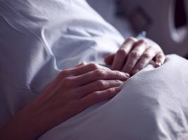 A patient on a hospital bed